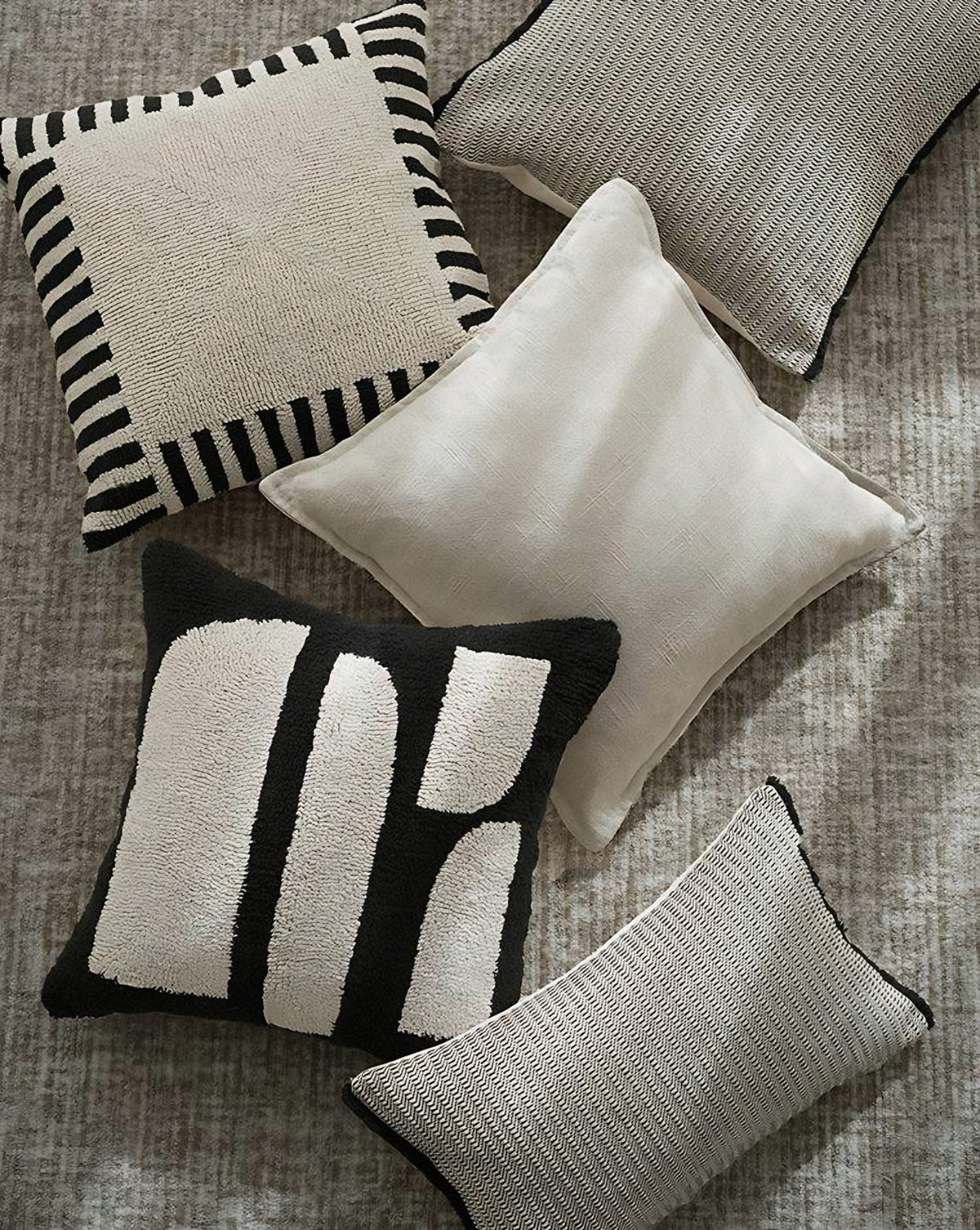 Ivory & Black Stripe embroidery cushion covers, styled at home