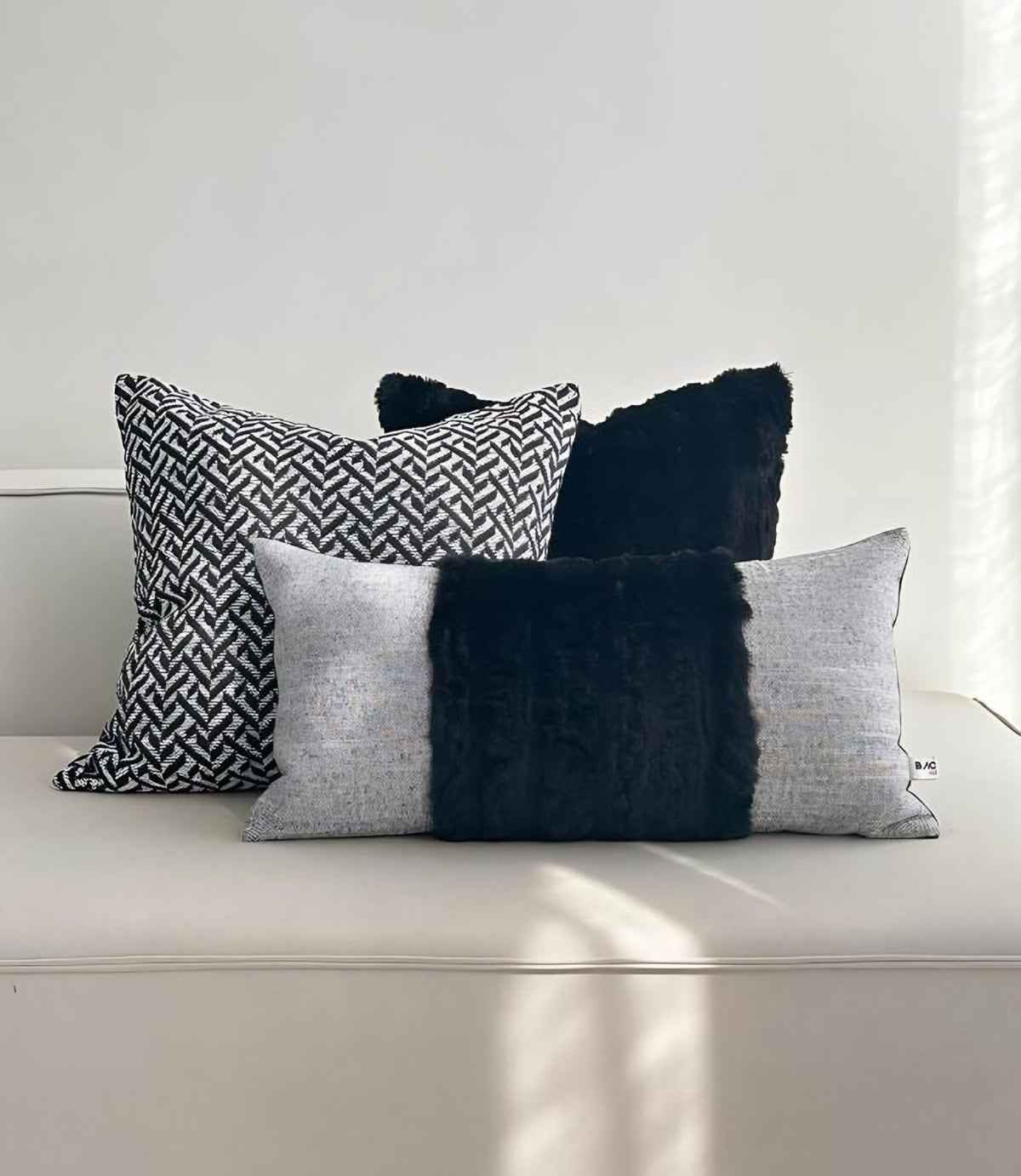 Black & Ivory Herringbone Jacquard Cushion Covers, styled at home