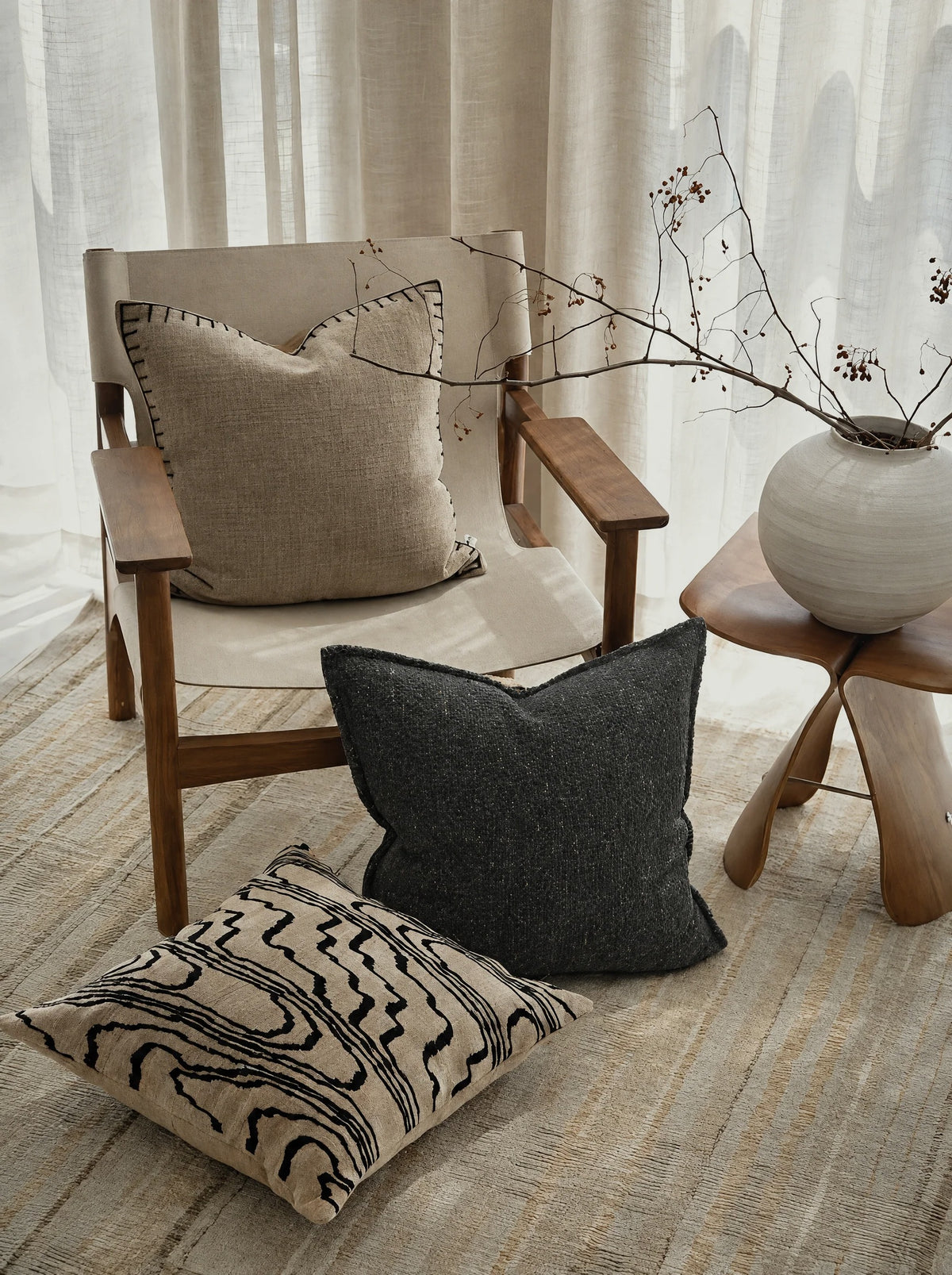 Sand & Black Wood Grain Embroidery Cushion Covers, styled at home