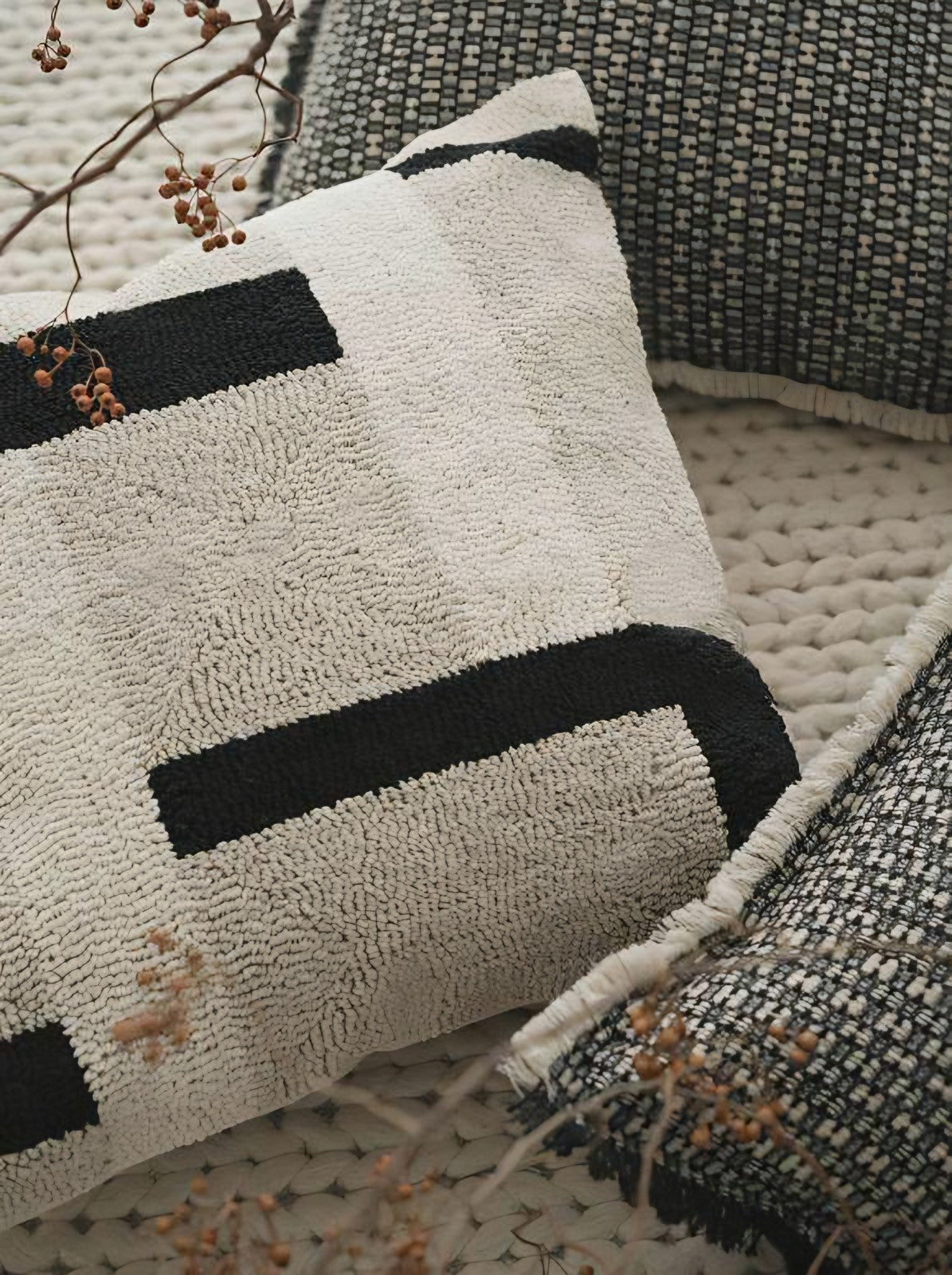 Ivory & Black loop-pile embroidery cushion covers, styled at home