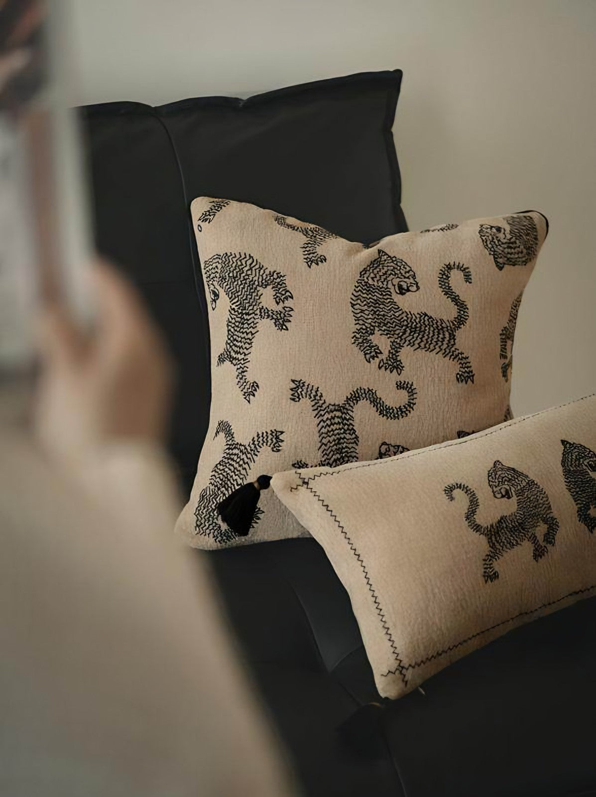 Sand & Black Tiger Embroidery Cushion Covers, styled at home