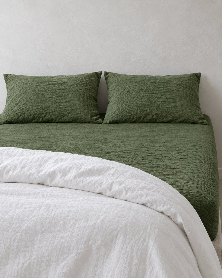 Juniper Green cloud cotton fitted sheet seen from above