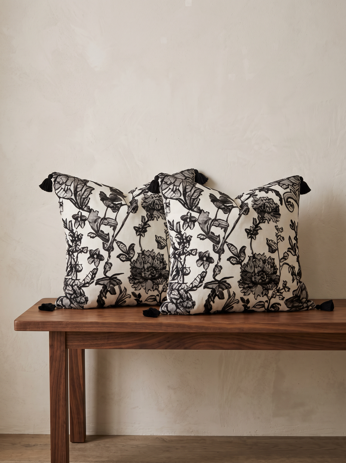 Ivory & Black Lace Jacquard Cushion Covers, styled at home on a walnut bench