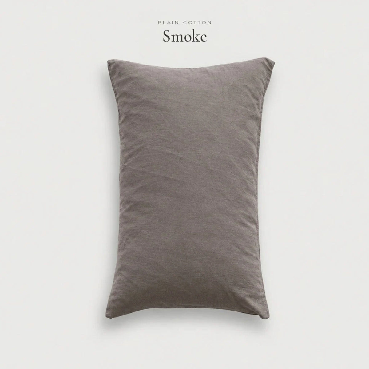 Smoke grey Plain Cotton pillowcase, studio shot on pale grey