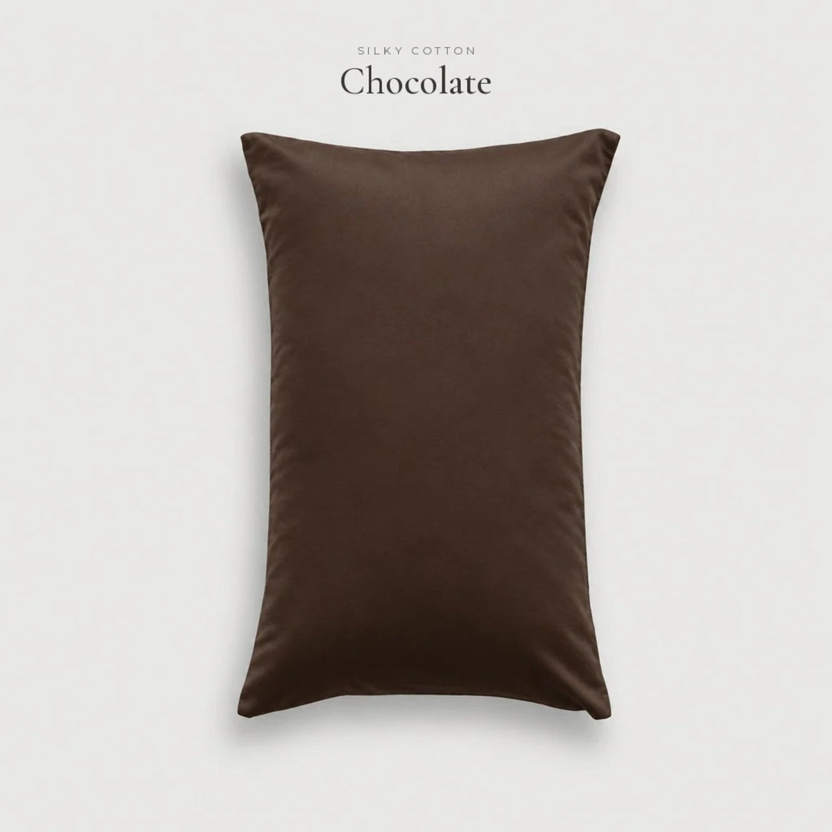 Chocolate brown Silky Cotton sateen pillowcase, studio shot on a pale grey background