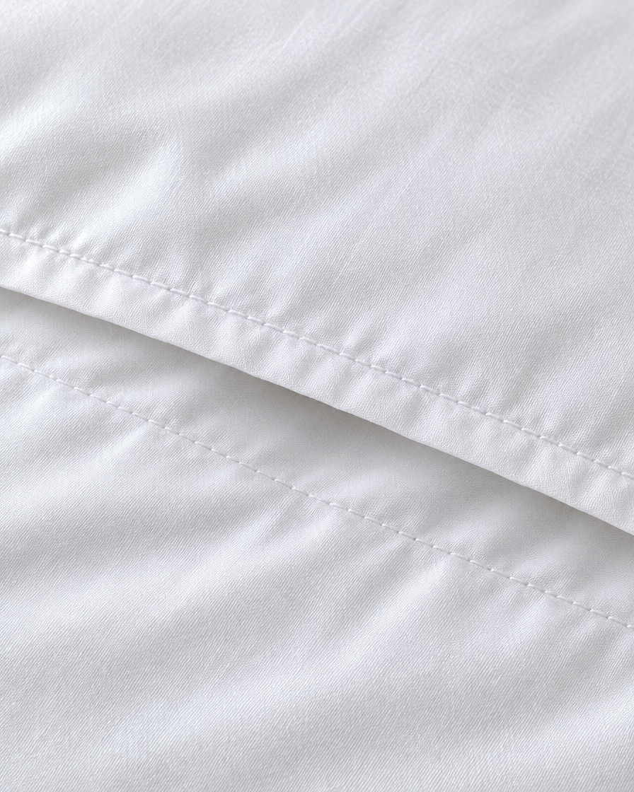 Close-up of stitched envelope opening hem of the pillowcase in Milky White Silky Cotton