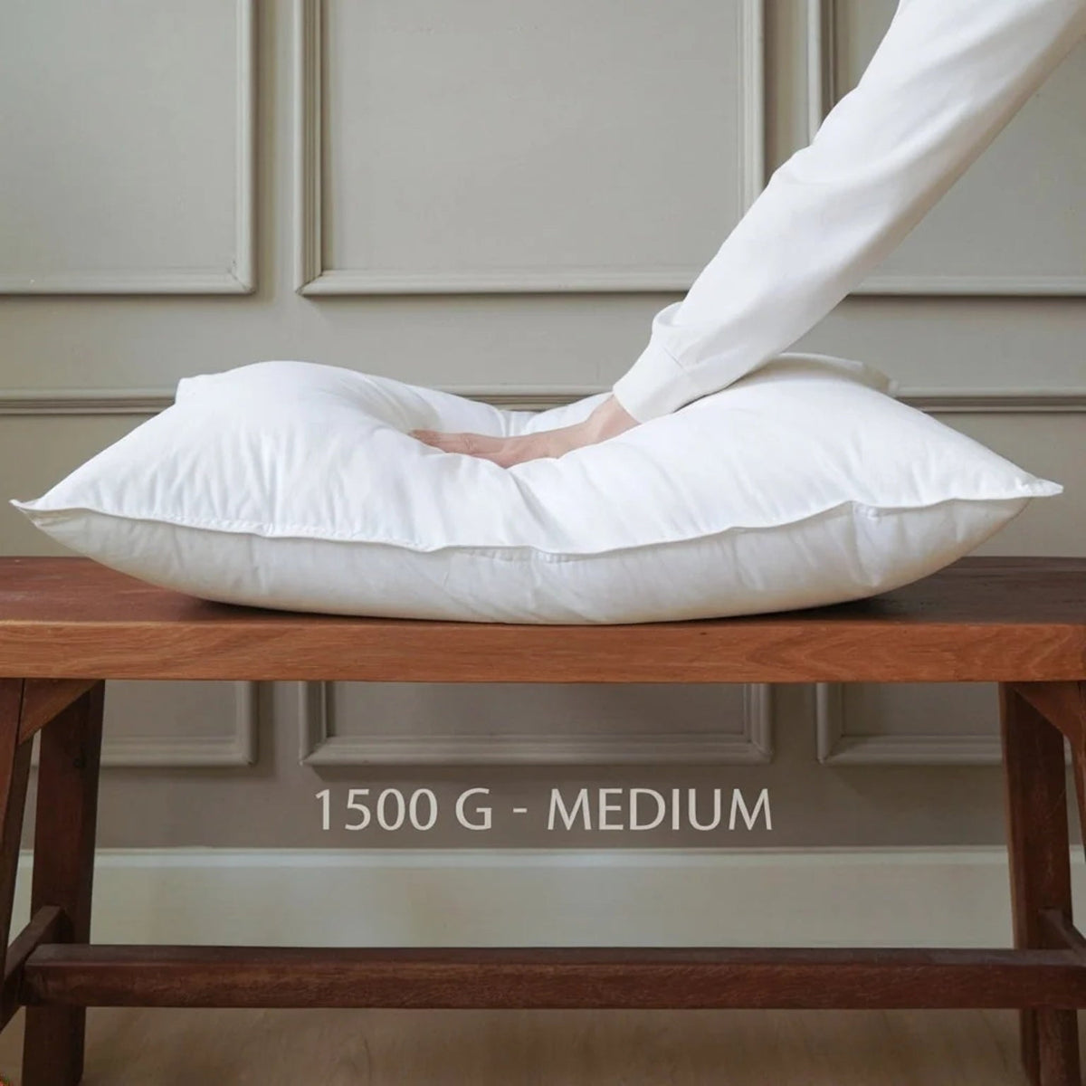 Microgel pillow insert in the 1500 g medium fill, pressed by hand to show the loft.