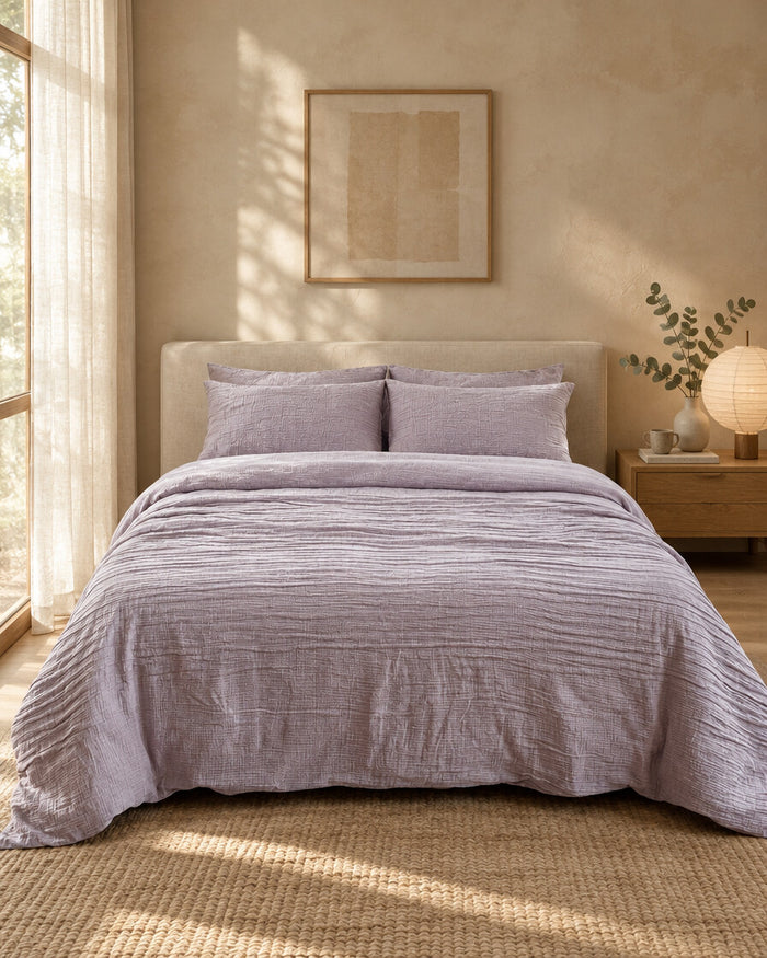 Taro lilac Cloud Cotton double gauze bedding on a made bed