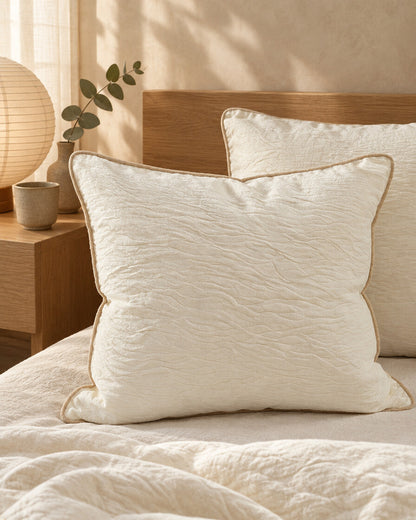 Cream piped cloud cotton pillows, styled in a serene Japandi bedroom