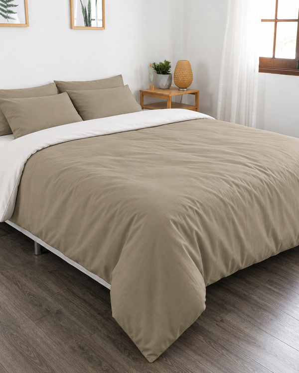 Beige duvet cover with off white reverse, off white fitted sheet and beige pillowcases in Plain Cotton
