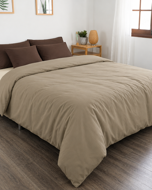Beige duvet cover, cream fitted sheet and chocolate pillowcases in Plain Cotton