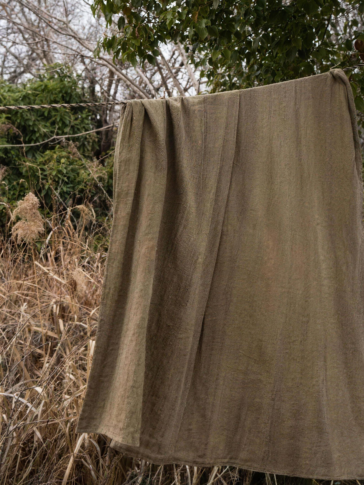 Enzyme-Washed Linen Cotton throw, styled at home