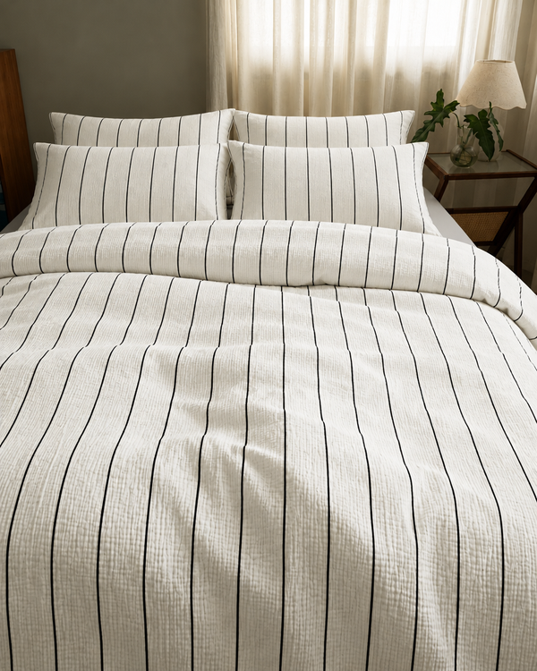 Black Pinstripe duvet cover, warm grey fitted sheet and black pinstripe pillowcases in Cloud Cotton