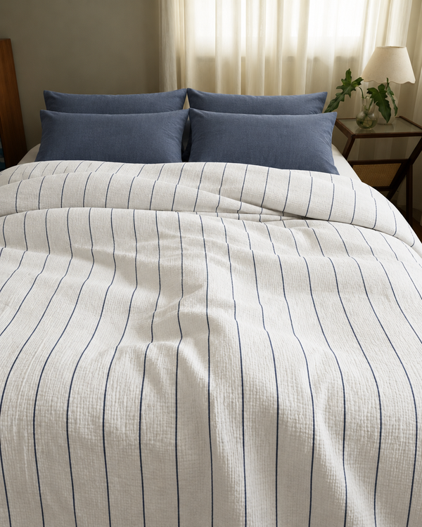 Blue Pinstripe duvet cover, off white fitted sheet and blue jeans pillowcases in Cloud Cotton