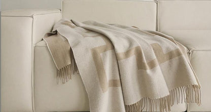 Fringed Key Border Lambswool throw, styled at home