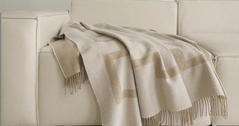 Fringed Key Border Lambswool throw, styled at home