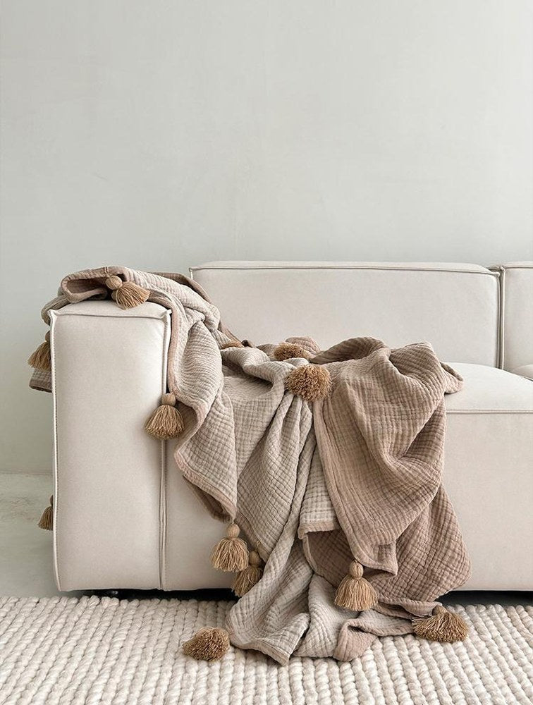 Taupe Five-Layer Cotton throw, styled at home