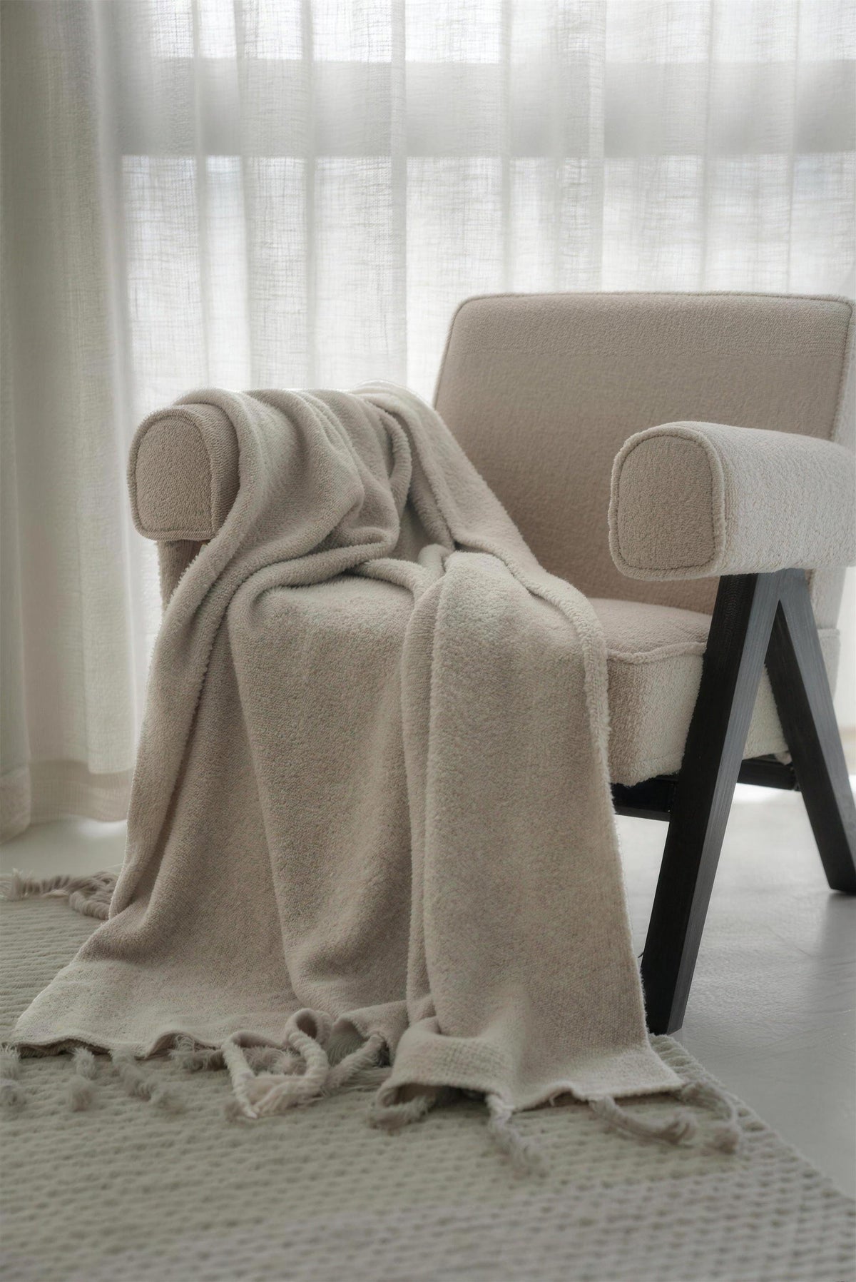 Chunky Knit Fringed throw, styled at home