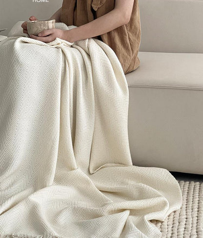 Ivory Herringbone Wool Blend throw, styled at home