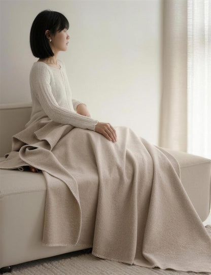 Blanket-Stitch Soft-Touch throw, styled at home