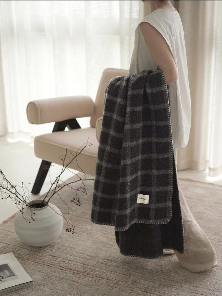 Black and Ivory Check Pure Wool throw, styled at home