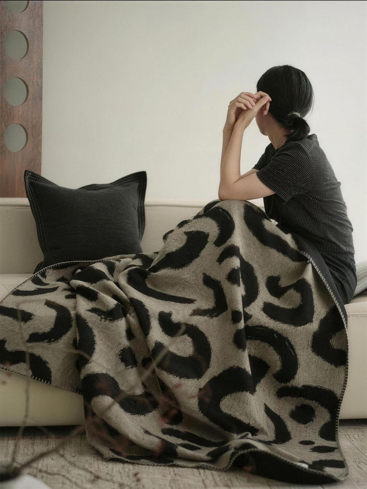 Ink Swirl Wool Blend throw, styled at home