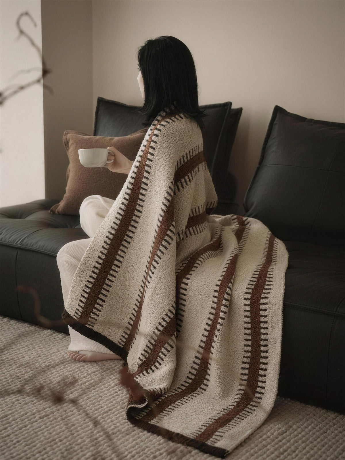 Cream and Brown Striped Woven throw, styled at home