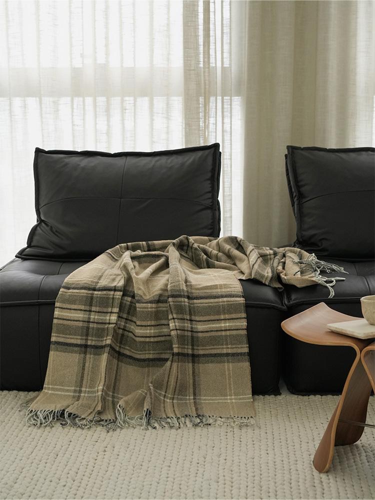 Olive Plaid Wool Blend throw, styled at home