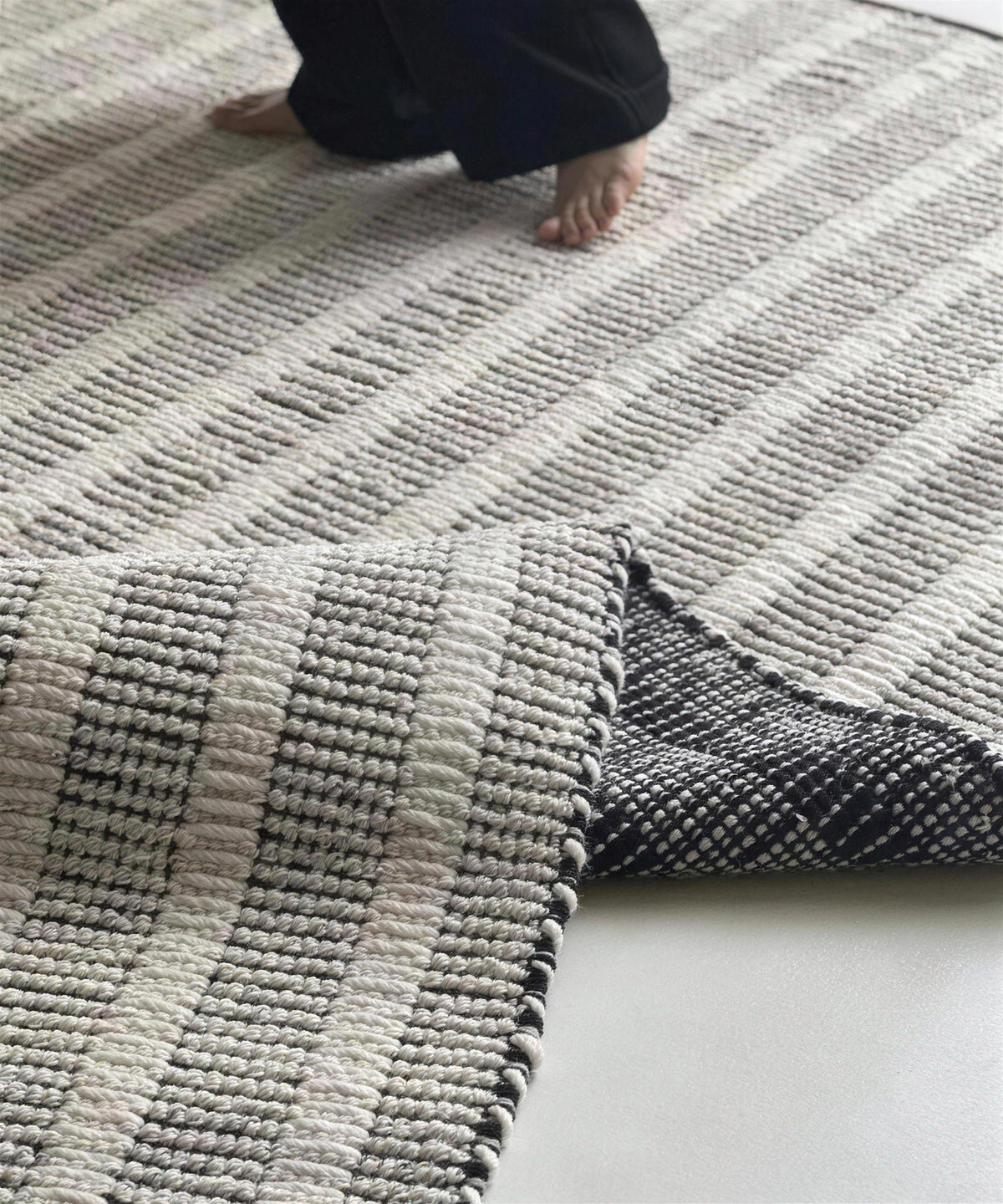 Striped Hand-Woven rug, styled at home