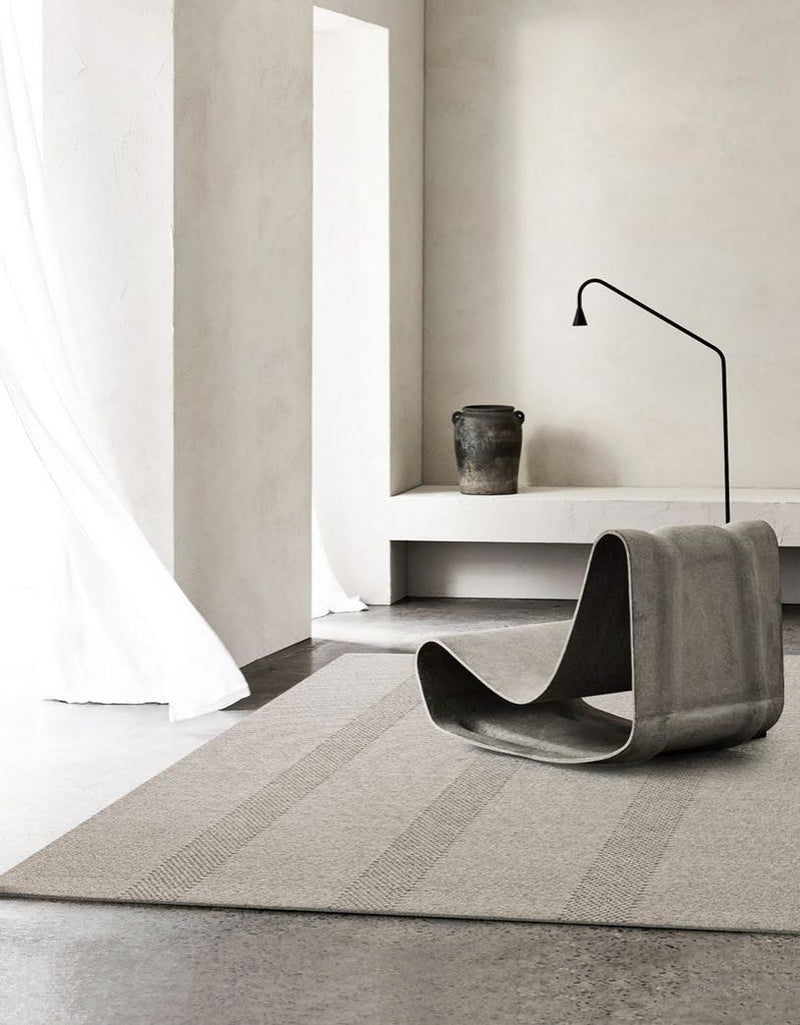 Striped Border Woven rug, styled at home