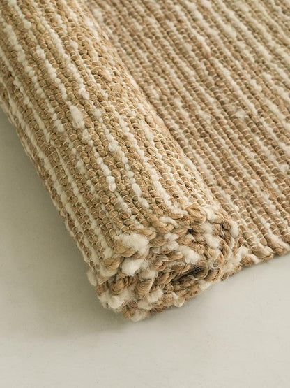 Jute and Wool Hand-Woven rug, styled at home