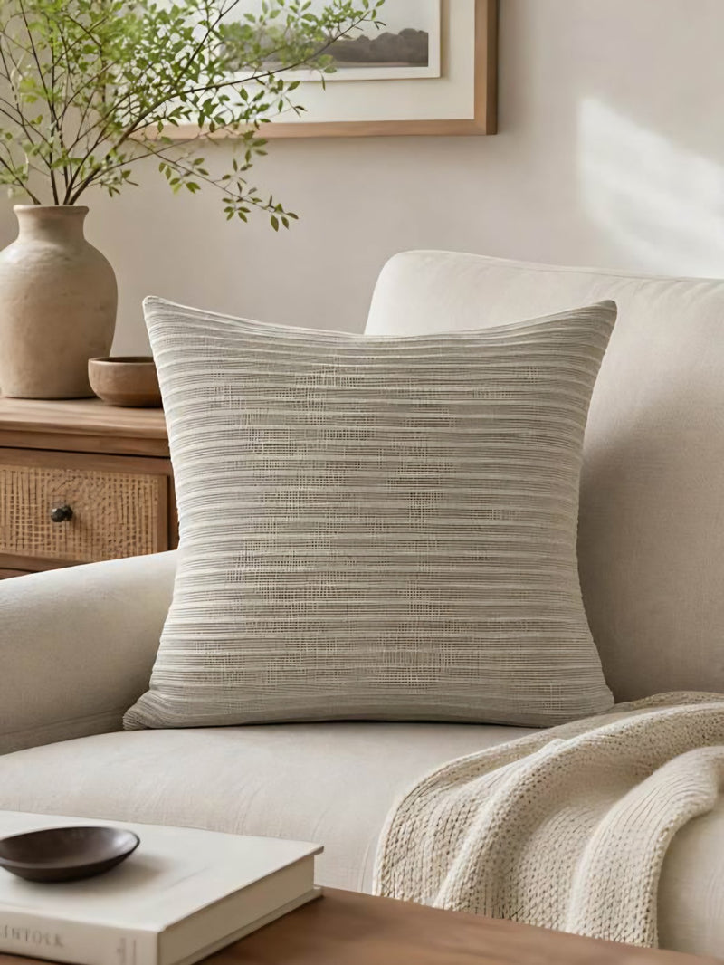 Oat Stripe jacquard cushion covers, styled at home