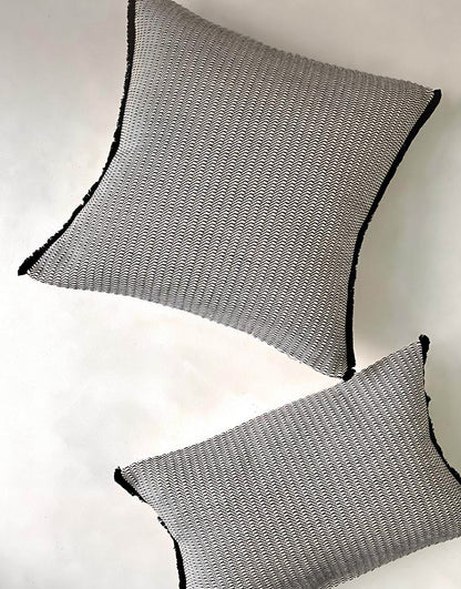 Grey & Black jacquard & tassel cushion covers, styled at home