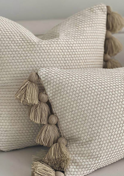 Oat jacquard & tassel cushion covers, styled at home