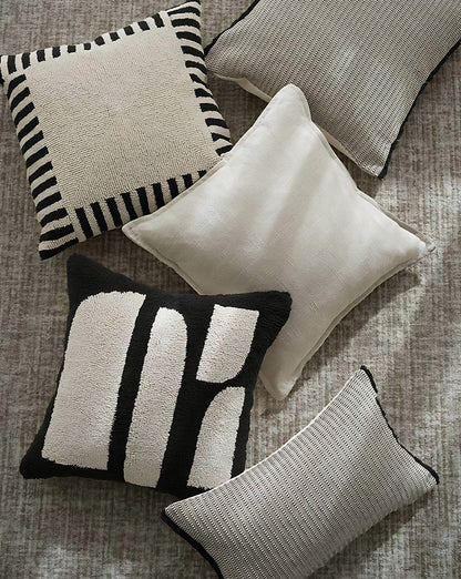 Ivory & Black Stripe embroidery cushion covers, styled at home