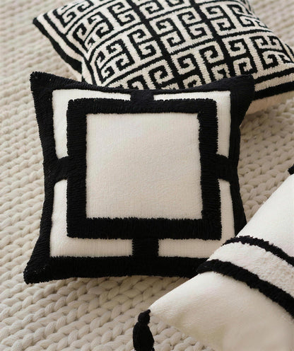 Ivory & Black Framed Tufted Embroidery Cushion Covers, styled at home