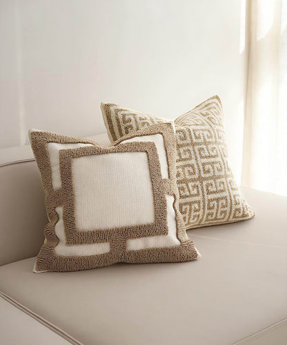 Ivory & Caramel loop-pile embroidery cushion covers, styled at home