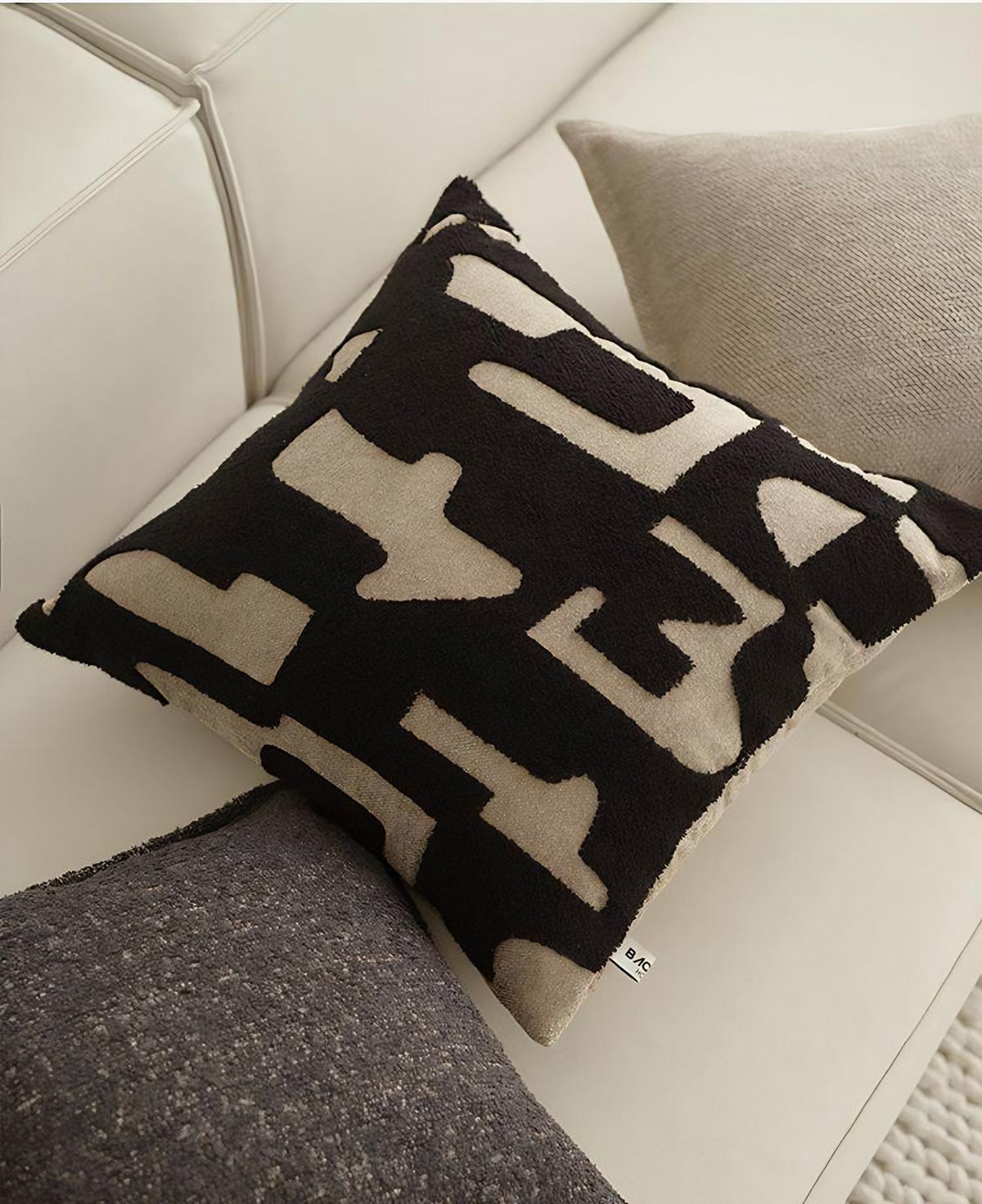 Black & Sand Abstract Jacquard Cushion Covers, styled at home