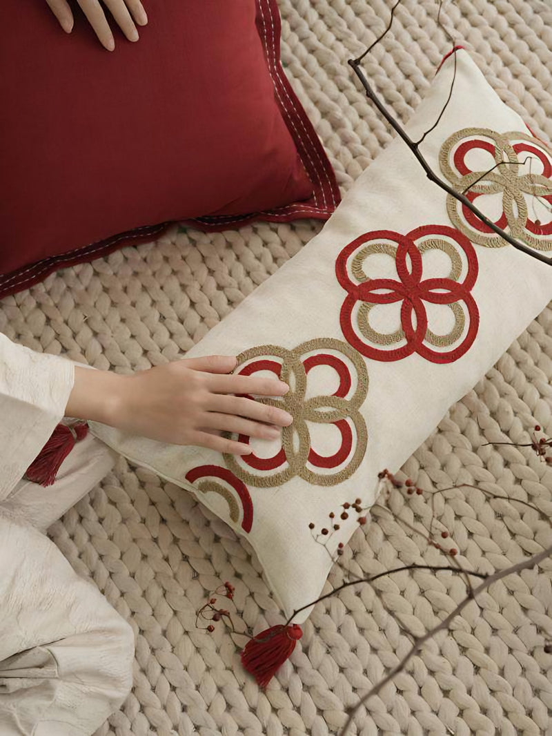 Ivory & Red Ring Embroidery Lumbar Cushion Covers, styled at home