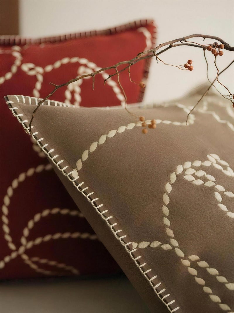 Red Floral Embroidery Cushion Covers, styled at home
