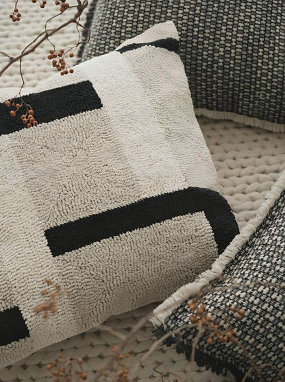 Ivory & Black loop-pile embroidery cushion covers, styled at home