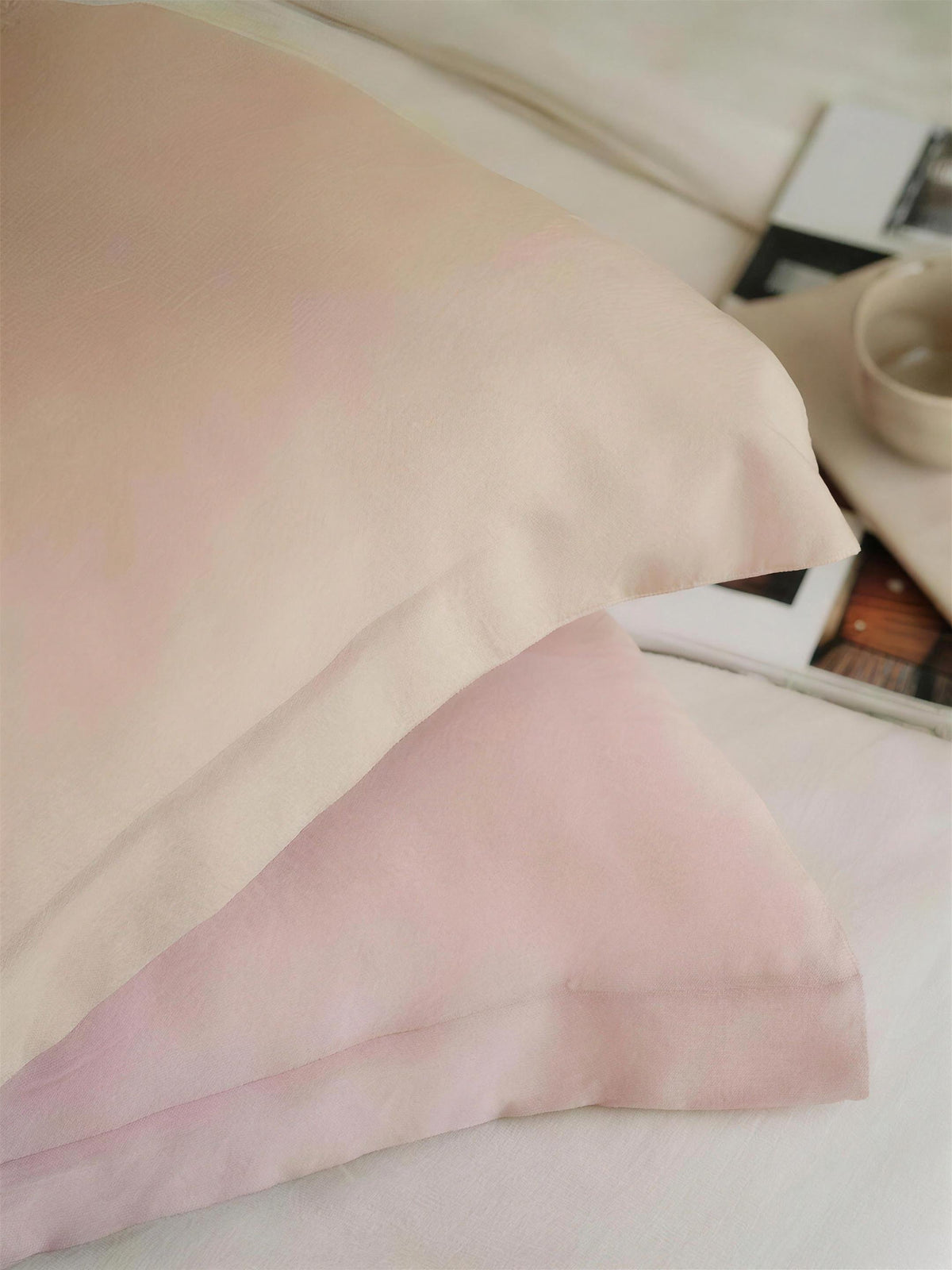 Blush double-face two-tone cushion covers, styled at home