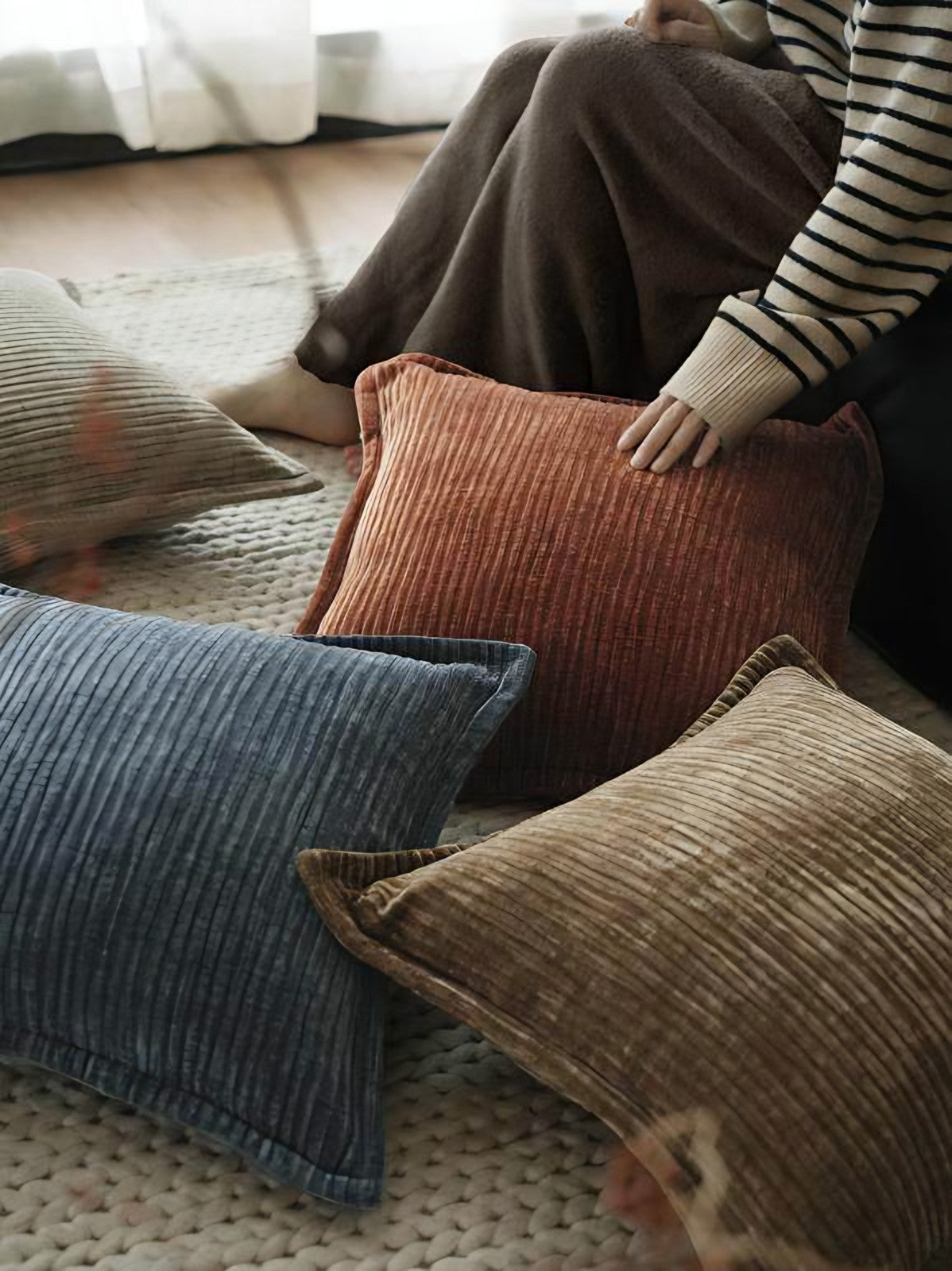 Rust washed velvet cushion covers, styled at home