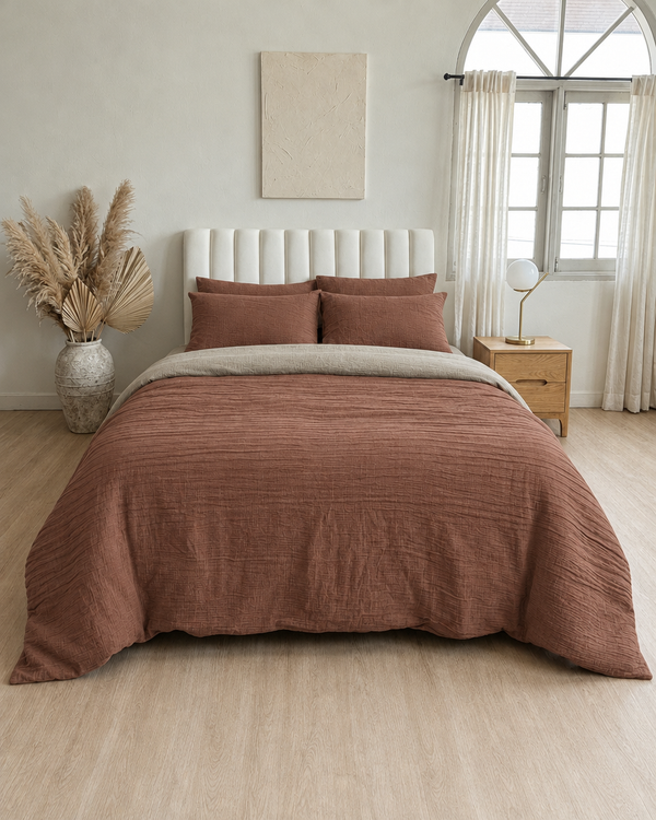 Copper duvet cover with oat milk reverse, oat milk fitted sheet and copper pillowcases in Cloud Cotton