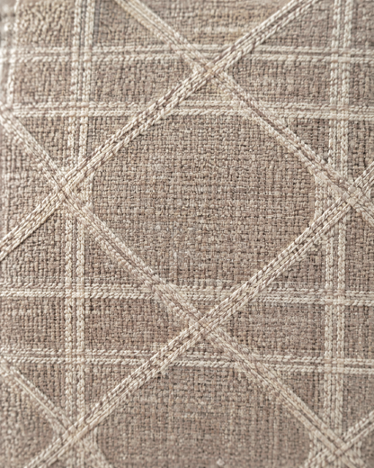 Macro close-up of the blush taupe lattice, a woven ivory cane lattice on slubby blush-taupe linen