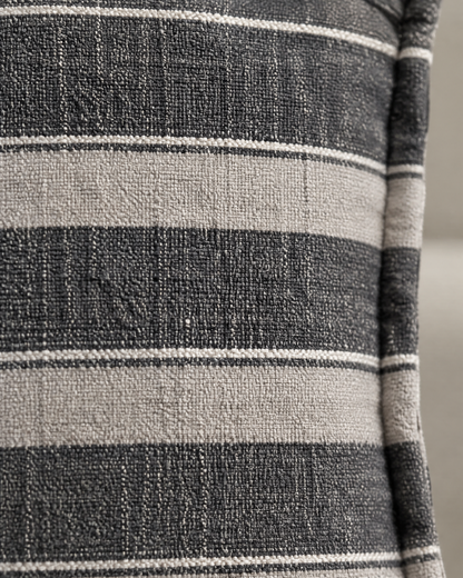 Macro close-up of the charcoal wide stripe, charcoal and stone linen bands edged with fine ivory pinlines