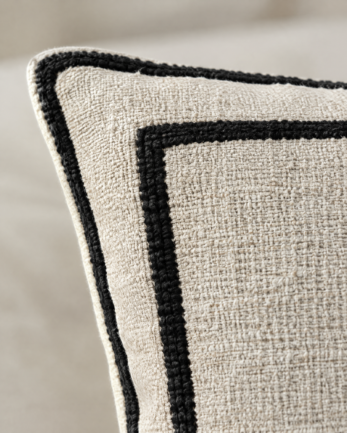 Close-up of linen jacquard with black double framed border