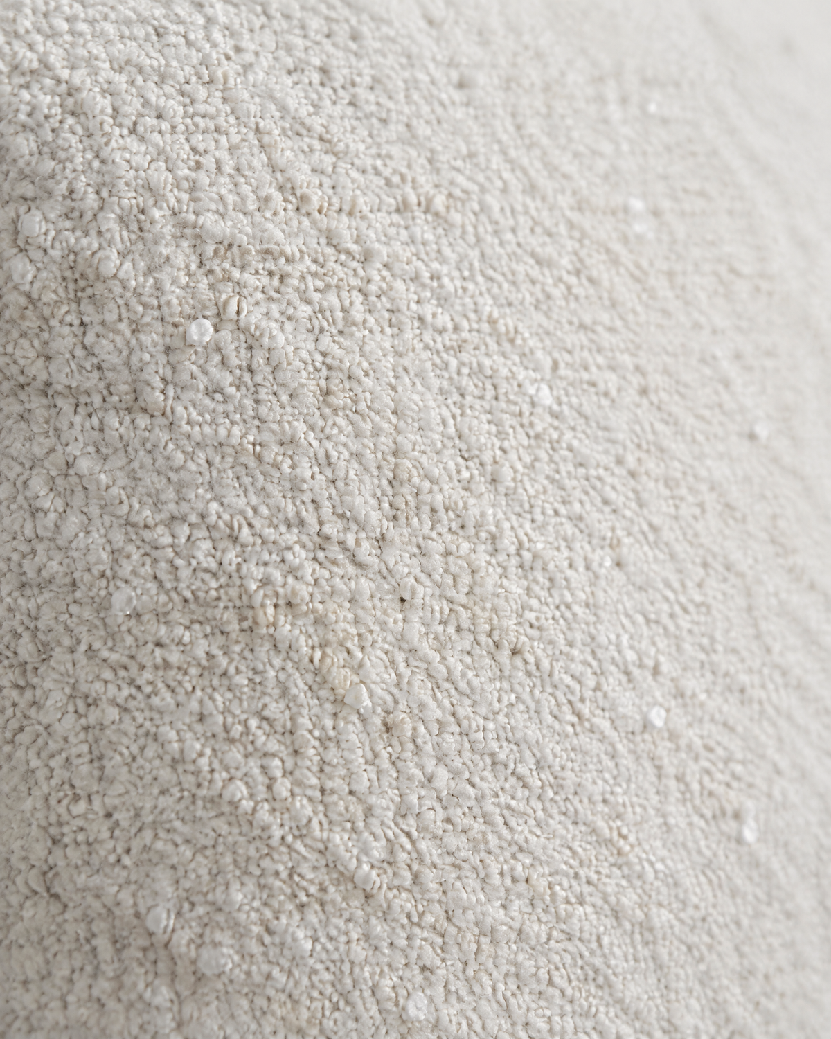 Close-up of ivory nubby jacquard wool