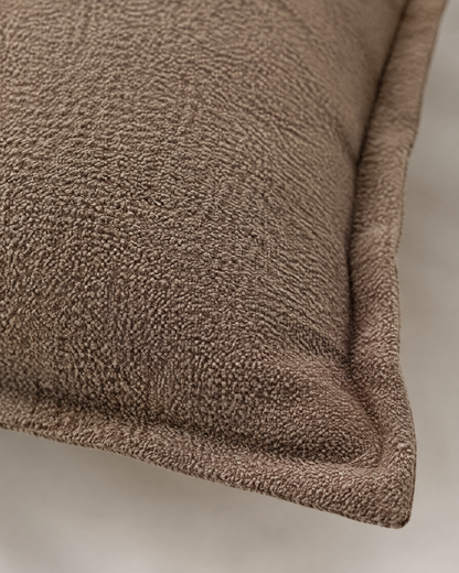Macro close-up of the mocha flanged cotton, a soft washed crinkle texture and the folded flange