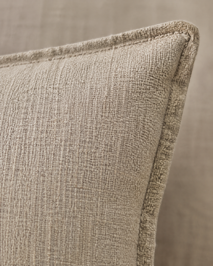 Macro close-up of the oat slub cover, thick-thin linen cotton slubs and the flat flange edge